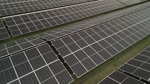 Aerial forward flight over a solar panel farm for renewable energy. Stock-Footage 334448018