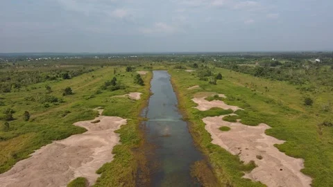 Aerial Forward Flight Over Tropical River and Savanna 4k Stock Footage 337639154