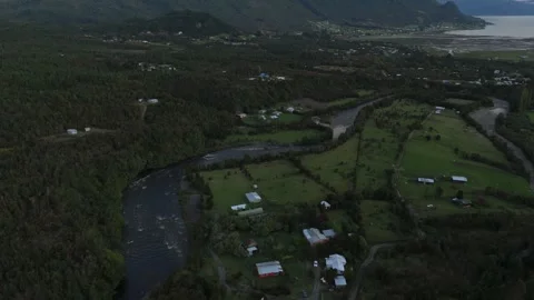 Aerial Forward Flight in Valley with Smooth Tilt Up to Mountain Horizon in Lenca Video stock 325329746