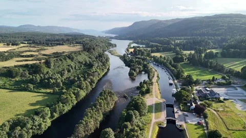 Aerial Forward Flyover of the Caledonian Canal at Dogcharroch, Scotland Stock Footage 331350073