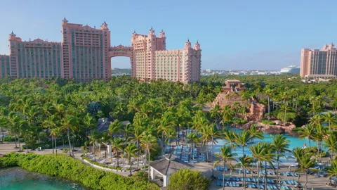 Aerial Forward Glide Towards Atlantis Paradise Island Resort and Royal Towers Stock Footage 345543213