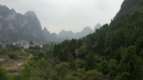 Aerial Forward: Idyllic view of landscape - Xingping, China Stock Footage 149698412