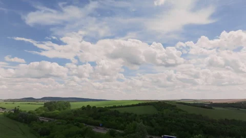 Aerial forward motion over fields and highway Stock Footage 264927314