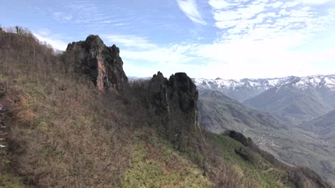 Aerial Forward Motion Through Dramatic Black Rock Spires and Rugged Terrain Video stock 337538139