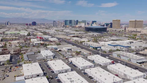 Aerial Forward Moving Shot of Las Vegas Strip Skyline and Industrial District Stockbeeldmateriaal 333666679