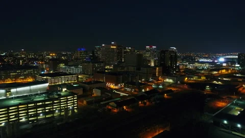 Aerial Forward Shot Of Illuminated Cityscape Against Sky At Night, Drone Flying Видео 249241152