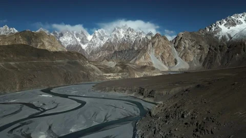 Aerial forward shot of Passu Cones and Karakoram Highway. Stock Footage 237024936