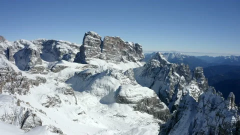Aerial Forward Shot Of Snow Covered Mountain Range On Sunny Day - Tre Cime di Stock Footage 201274357