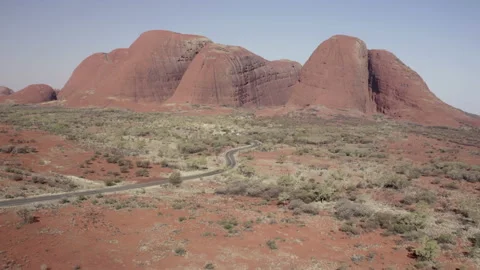 Aerial Forward Slow: Mount Olga Seen With Road Approaching-Kata Tjuta, Australia Stock Footage 149137951