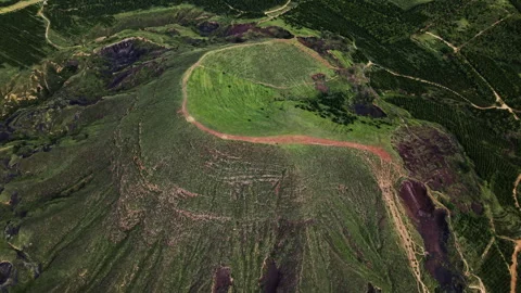 Aerial Forward Tilt Volcano Red Ridge Dramatic Shadows 4K HLG Stock Footage 344010585