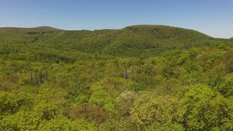 Aerial forward tracking forested mountains in western North Carolina Video stock 110964746