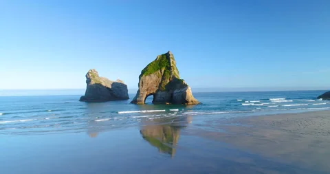 Aerial forward tracking of rock formation of Archway Islands,New zealand Stock Footage 140681038