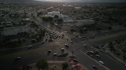 Aerial of four way intersection in Henderson Nevada suburbs at sunset Vidéo 253737086
