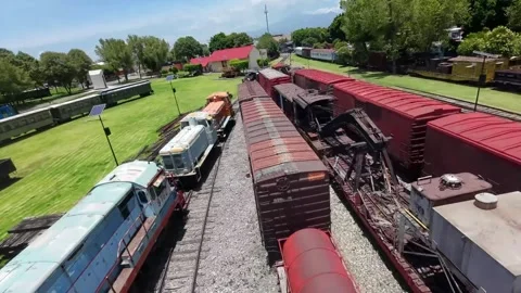 Aerial FPV Drone Flight Over Train Station and Railway Tracks Stock Footage 342549595