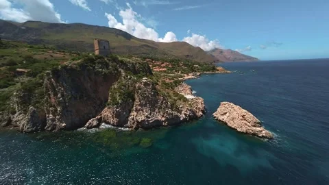 Aerial FPV drone flight through cliffs near Scopello, Sicily, Italy, 4K 60p Stock Footage 288652091