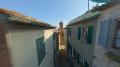 Aerial fpv drone view flying through narrow stone alleyway in a historic tu.. Stock Footage 337805514