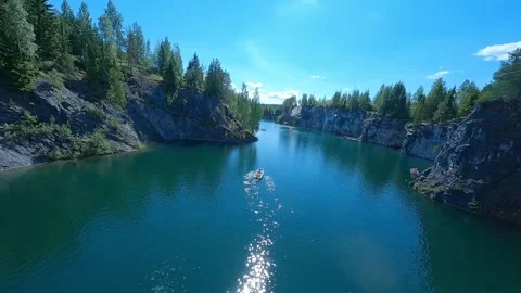 Aerial FPV drone view, in forest and stones 動画素材 325773357