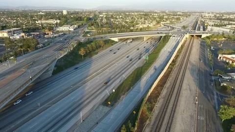 Aerial of Freeway and Train Track Stock-Footage 91568972