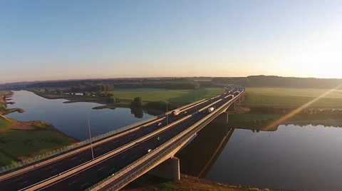 Aerial freeway crossing river Stock Footage 39933908