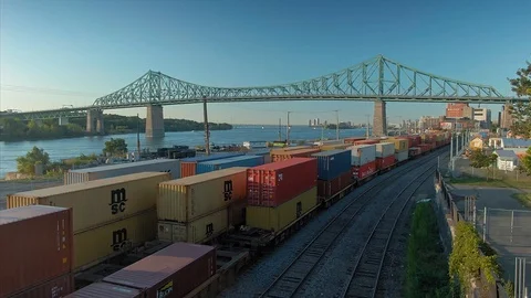 Aerial: Freight train and bridge. Montreal, Quebec, Canada Stock Footage 122114938