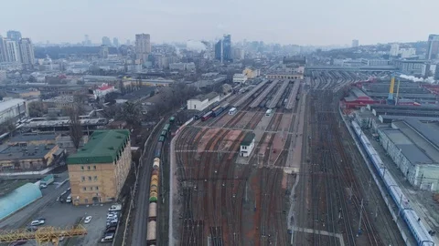 Aerial. Freight train move through the railway hub with many trains.  4K Stock Footage 121968723