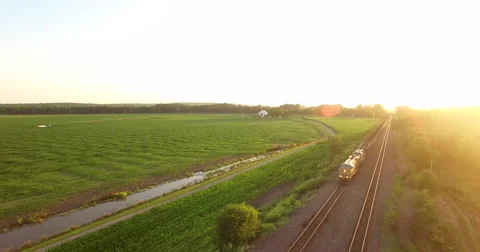 Aerial of freight train passing through the field in Kansas City Stock-Footage 61768000
