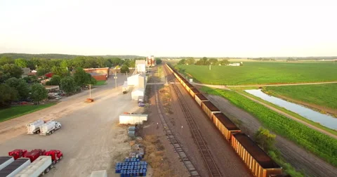 Aerial of freight train passing through the field in Kansas City 스톡 동영상 61768054
