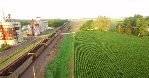 Aerial of freight train passing through the field in Kansas City Stock-Footage 61768092