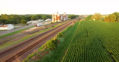 Aerial of freight train passing through the field in Kansas City 스톡 동영상 61768249
