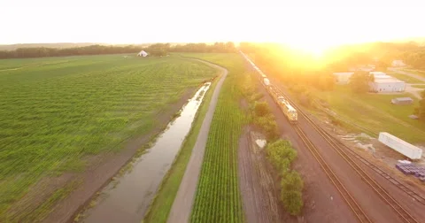 Aerial of freight train passing through the field in Kansas City 스톡 동영상 61769019