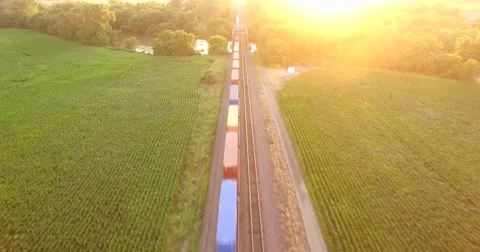 Aerial of freight train passing through the field in Kansas City 스톡 동영상 61769246