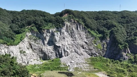 Aerial Front Drone Shot of Massive Stone Quarry Cliff – 4K Stock Footage 319050023
