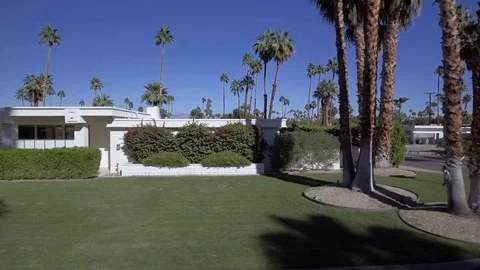 Aerial of front of modern Palm Springs house. 4k drone.  Known as the The Stock Footage