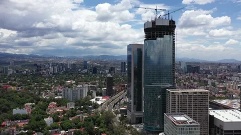 Aerial in front of the talles skyscraper under construction in Mexico City Stock Footage 135536259