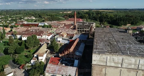 Aerial from front to top view of brick pipe tower of abandoned construction Stockbeeldmateriaal 119026714