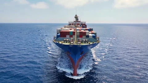 Aerial front tracking view of a medium sized container cargo vessel Video stock 294979430