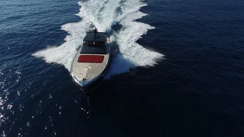 Aerial front view of a boat navigating slowly. Stock Footage 122986715