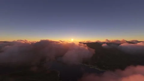 Aerial front view at sunset flying above the clouds of Lake Isabella, California Stock Footage 213974686