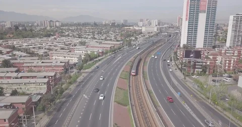 AERIAL FRONTAL SHOT OF TRAIN METRO SUBWAY IN SANTIAGO WITH VIEWS OF THE CITY Stock Footage 101334155