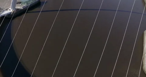 Aerial of Gateshead Millenium Bridge starting close in cables to full view Stock Footage 159152187