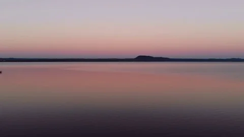 Aerial generic drone shot over lake before sunrise Stock Footage 129481457