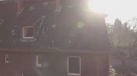 Aerial of a ghosttown, tracking shot from left to right ending with a lens flare Stock Footage 59779697