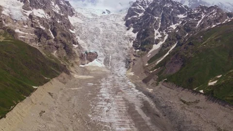 Aerial glacier and U shaped valley in Svaneti between Mestia and Ushguli Stock Footage 327609166