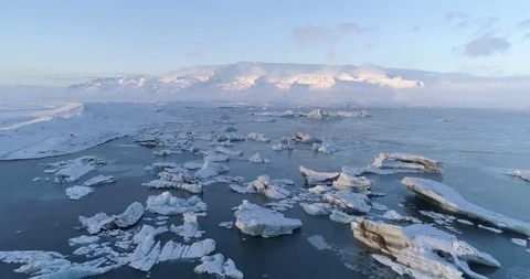 Aerial of glacier patterns and shapes in lake Stock Footage 116255774