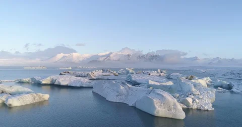 Aerial of glacier patterns and shapes in lake Stock Footage 116256004