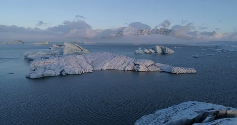 Aerial of glacier patterns and shapes in lake Stock Footage 116256845