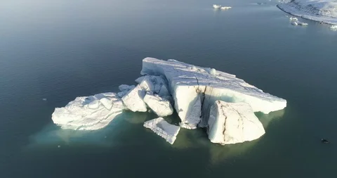 Aerial of glacier patterns and shapes in lake Stock Footage 116257387