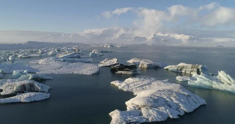 Aerial of glacier patterns in lake water Stock Footage 116257686