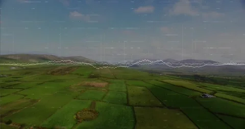 Aerial glide advancing, dotted waveform pulsing over hills and farmland, Stock Footage 334311848