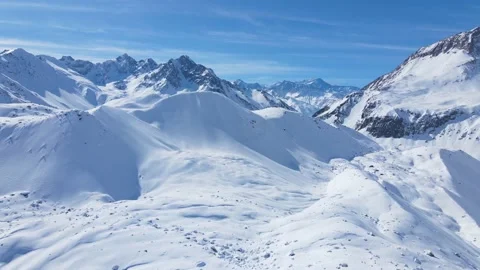 Aerial going backwards over snow dunes, Chile Stock Footage 134984493